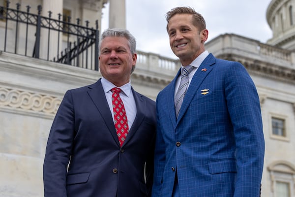 Newly elected members of Congress Mike Collins (R-GA), and Rich McCormick (R-GA) pose for photos on the steps of the U.S. Capitol in Washington, D.C. on Nov. 15, 2022. Collins has been named to the Science, Space, and Technology Committee as well as the Natural Resources Committee. (Nathan Posner for The Atlanta Journal-Constitution)