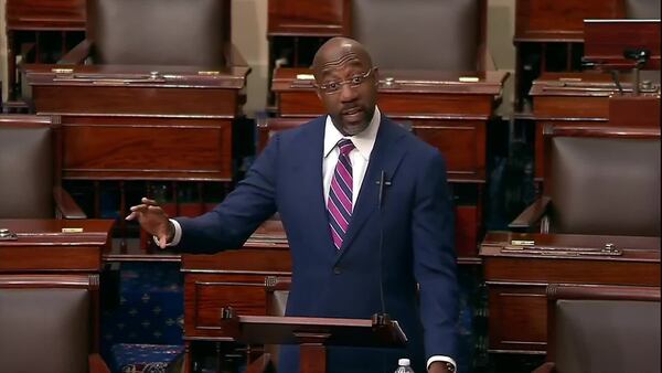 Sen. Raphael Warnock, shown speaking at the U.S. Capitol following shootings in Midtown Atlanta in May, has pressed his colleagues to pass gun control measures, such as universal background checks. “I think the unspoken assumption is that this will not visit me; it will not happen to my family,” Warnock said in December. “When you consider that there have been 630 mass shootings already this year, sadly, the chances are quite good that this could visit any one of us. And we ought to do our work here in the Congress as if we are protecting our own families.” (screen grab from Senate livestream)