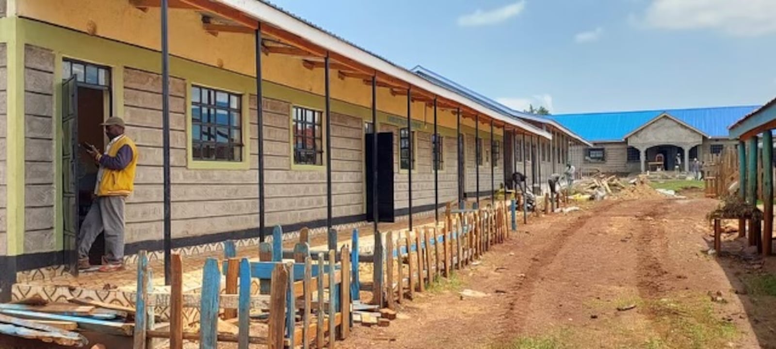 Work is being done to give a school in Kenya a renovation with wood and tile floors -- not dirt floors -- and bathrooms with stalls, doors and running water. Where they have finished work, locals are celebrating better facilities for their children to attend school. Courtesy of TFalls Foundation