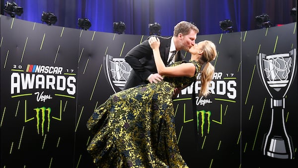 LAS VEGAS, NV - NOVEMBER 30:  Dale Earnhardt Jr. shares a moment with his wife Amy following the Monster Energy NASCAR Cup Series awards at Wynn Las Vegas on November 30, 2017 in Las Vegas, Nevada.  (Photo by Jonathan Ferrey/Getty Images)