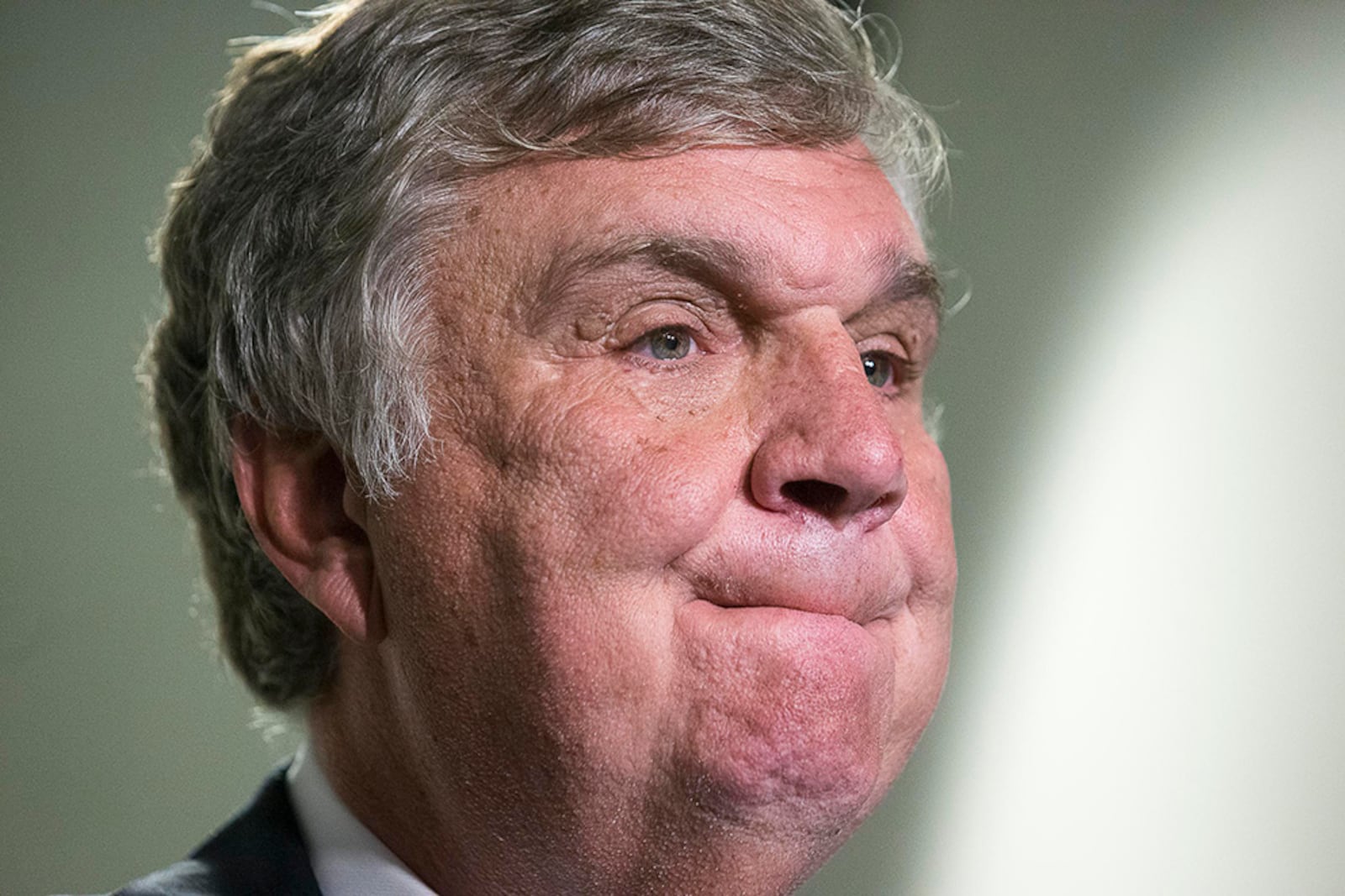 Former Georgia Tech football coach Paul Johnson takes a moment as he speaks about Brandon Adams before a memorial service Monday, March 25, 2019, at McCamish Pavilion in Atlanta. Adams, 21, died Saturday after collapsing at a friend's home near campus.