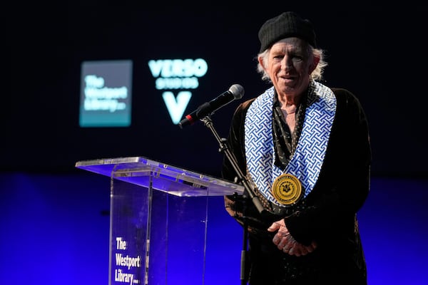 Musician Keith Richards speaks after receiving the first Connecticut Governor's Award of Excellence in Westport, Conn., Wednesday, March 5, 2025. (AP Photo/Seth Wenig)