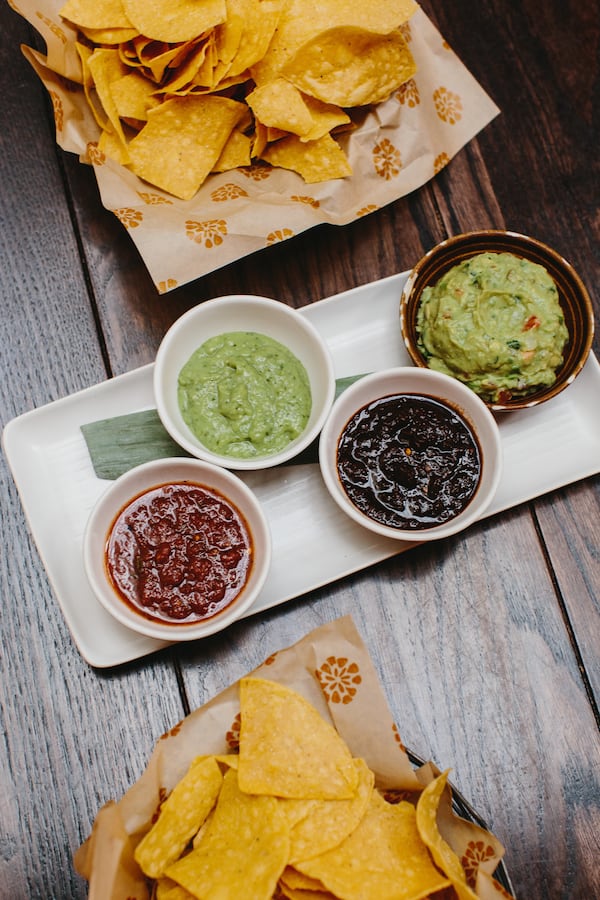 Alma Cocina offers a tasting flight featuring salsa and guacamole. Courtesy of Fifth Group Restaurants