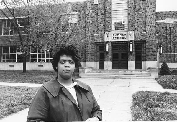  This May 8, 1964 file photo shows Linda Brown Smith standing in front of the Sumner School in Topeka, Kansas. The landmark Brown v. Board of Education decision was made 70 years ago this week.