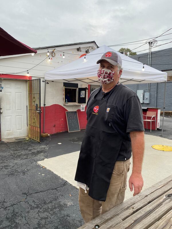 BBQ Cafe partner Lloyd Solomon stands outside the new spot in downtown Decatur, across from Kimball House. Courtesy of Lloyd Solomon