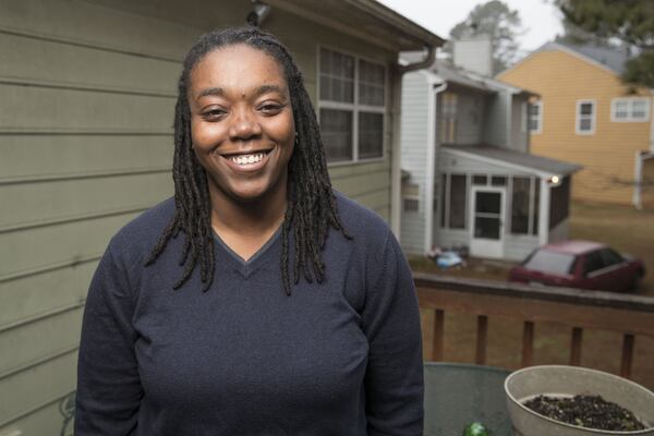 01/11/2018 — Lithonia, GA - Shantae Martin, 28, poses for a portrait at her Lithonia Springs residence, Thursday, January 11, 2018. Shantae, a self proclaimed millennial, participated in an AJC poll where she suggested marijuana should be legalized. ALYSSA POINTER/ALYSSA.POINTER@AJC.COM