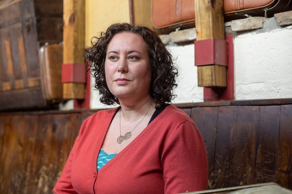 Former New Realm Brewing beer program manager Jennifer Blair sits for a portrait at The Porter Beer Bar in Atlanta’s Little Five Points community, Monday, June 14, 2021. (Alyssa Pointer / Alyssa.Pointer@ajc.com)