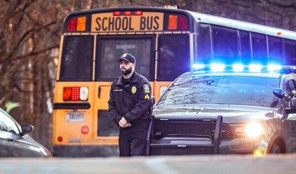 The morning after four students were shot at Benjamin E. Mays High in Atlanta, their classmates returned to school Thursday, Feb. 15,2024 amid increased security. The shooting, which broke out in the parking lot shortly before 4 p.m. on Wednesday as students were being dismissed, left the community rattled as the victims three 17-year-olds and an 18-year-old were rushed to a hospital. Their injuries weren’t considered life-threatening. (John Spink / John.Spink@ajc.com)

