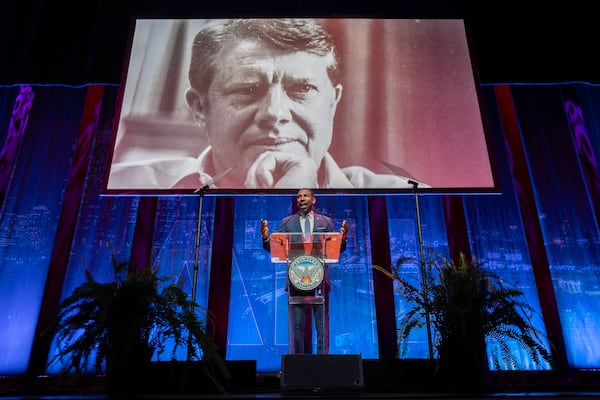 Mayor Andre Dickens speaks about former President Jimmy Carter while giving the final State of the City address of his first term at Woodruff Arts Center in Atlanta on Tuesday, February 25, 2025. (Arvin Temkar / AJC)