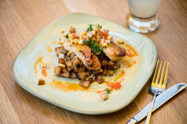  Pan Roasted Redfish with rosti potatoes, smoked corn pico de gallo, and red chilli butter sauce. Photo credit- Mia Yakel.