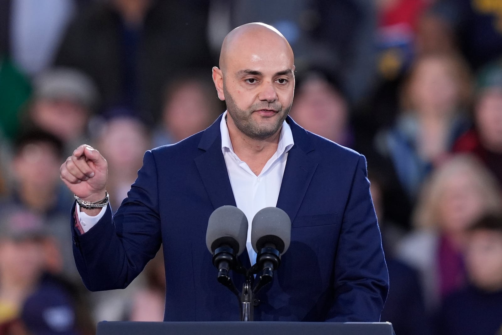 Assad Turfe, of Dearborn, Mich., speaks at a campaign rally for Democratic presidential nominee Vice President Kamala Harris at Burns Park in Ann Arbor, Mich., Monday, Oct. 28, 2024. (AP Photo/Carlos Osorio)