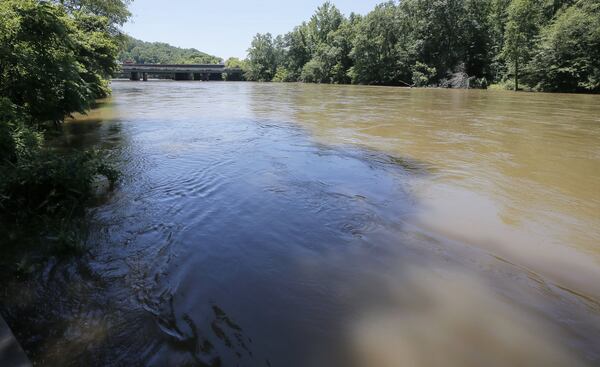 The water lever at Powers Island is as high as the top of the boat ramp. BOB ANDRES / BANDRES@AJC.COM