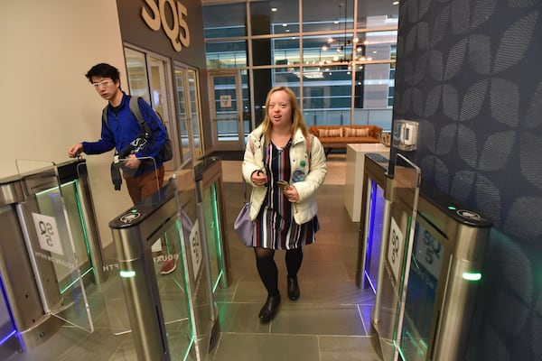 Alex Goodman walks to her midtown Atlanta apartment after class at Georgia Tech’s Scheller College of Business as a part of the EXCEL program for students with intellectual disabilities. 