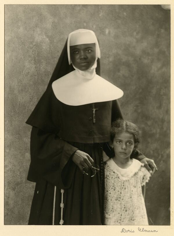 “Member of the Order of Sisters of the Holy Family and Child (probably a student), New Orleans, LA” (December 1931) by Doris Ulmann. CONTRIBUTED BY DORIS ULMANN FOUNDATION, BEREA COLLEGE ART COLLECTION