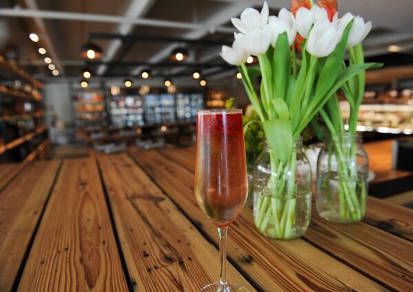 Italian 75 cocktail with Limoncello, prosecco, raspberry, mint. (BECKY STEIN PHOTOGRAPHY)