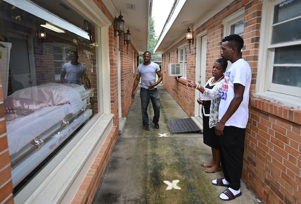 Lorena Barnum Sabbs directs staff members as they prepare for a visitation at Barnum Funeral Home in Americus. While most foot traffic inside the home has been barred during the pandemic, a window was added so visitors can see the deceased during the visitation part of a funeral. The Barnum family's funeral business has served Sumter County's black community for 115 years, after the Barnums came out of slavery from nearby Stewart County.   (Hyosub Shin / Hyosub.Shin@ajc.com)