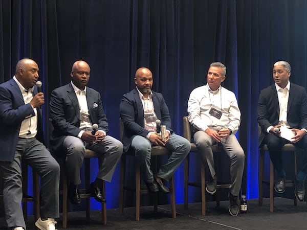 Former NFL head coaches Marvin Lewis, Jim Caldwell and Hue Jackson are on a panel with former Ohio State head coach Urban Meyer. The panel at the Quarterback Coaching Summit was moderated by Steve Wyche of the NFL Network. (By D. Orlando Ledbetter/dledbetter@ajc.com)