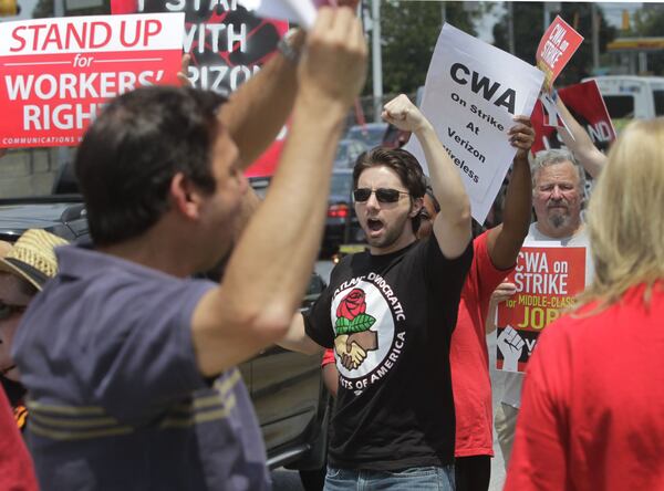 Protesters from the Metro Atlanta Democratic Socialists of America in this 2011 file photo. BOB ANDRES / BANDRES@AJC.COM