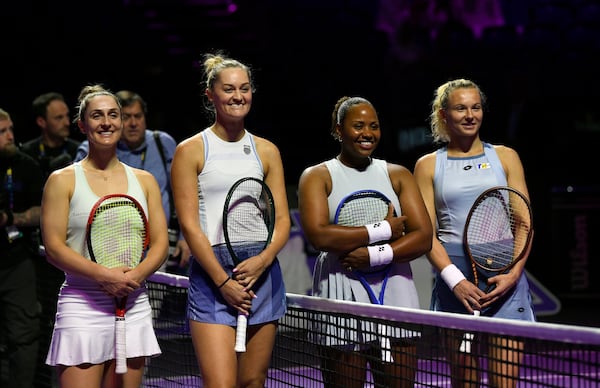 From left, Canada's Gabriela Dabrowski, New Zealand's Erin Routliffe, Taylor Townsend of the U.S. and Katerina Siniakova of the Czech Republic pose ahead of their women's doubles final match of the WTA finals at King Saud University Indoor Arena, in Riyadh, Saudi Arabia, Saturday, Nov. 9, 2024. (AP Photo)