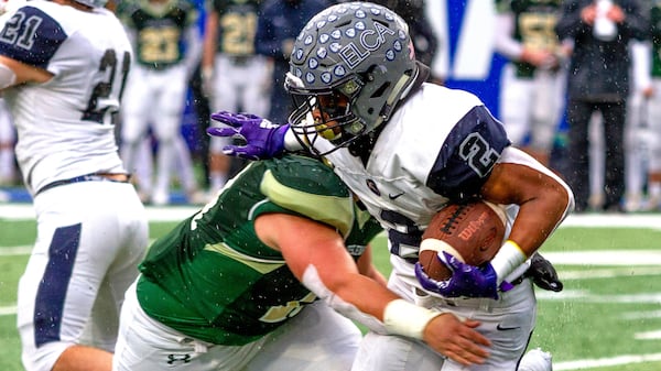 Eagle's Landing Christian Academy's Keaton Mitchell puts a move on a Wesleyan High School player during the Class A-Private championship game Friday, Dec. 13, 2019, at Georgia State Stadium in Atlanta.