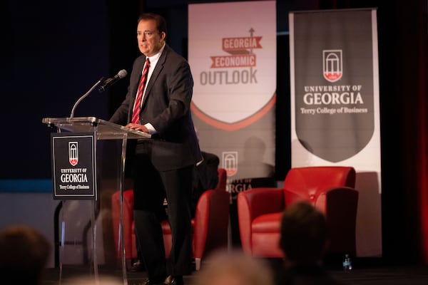 Dean Ben Ayers delivers the state of the Georgia Economy during the Georgia Economic Outlook presented by UGA - Terry College of Business at the Georgia Aquarium on Friday.