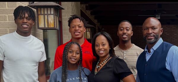 Former Georgia star linebacker Randall Godfrey with his family. Left to right: RJ Godfrey, Grant Godfrey (red shirt), Kendal Godfrey (blue shirt), Rhonda Godfrey, Billy Godfrey and Randall Godfrey on May 14, 2023. (Photo courtesy of Randall Godfrey)