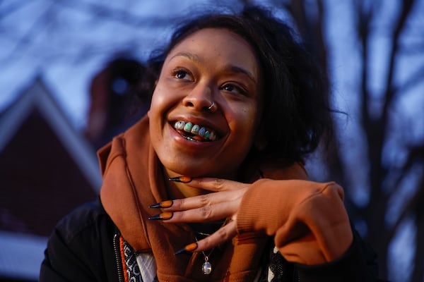 Keypsiia Gipp, daughter of  Goodie Mob member Big Gipp  poses for a portrait in the front yard of The Dungeon Family home in Atlanta on Monday, Feb. 17, 2025. Natrice Miller/ AJC)