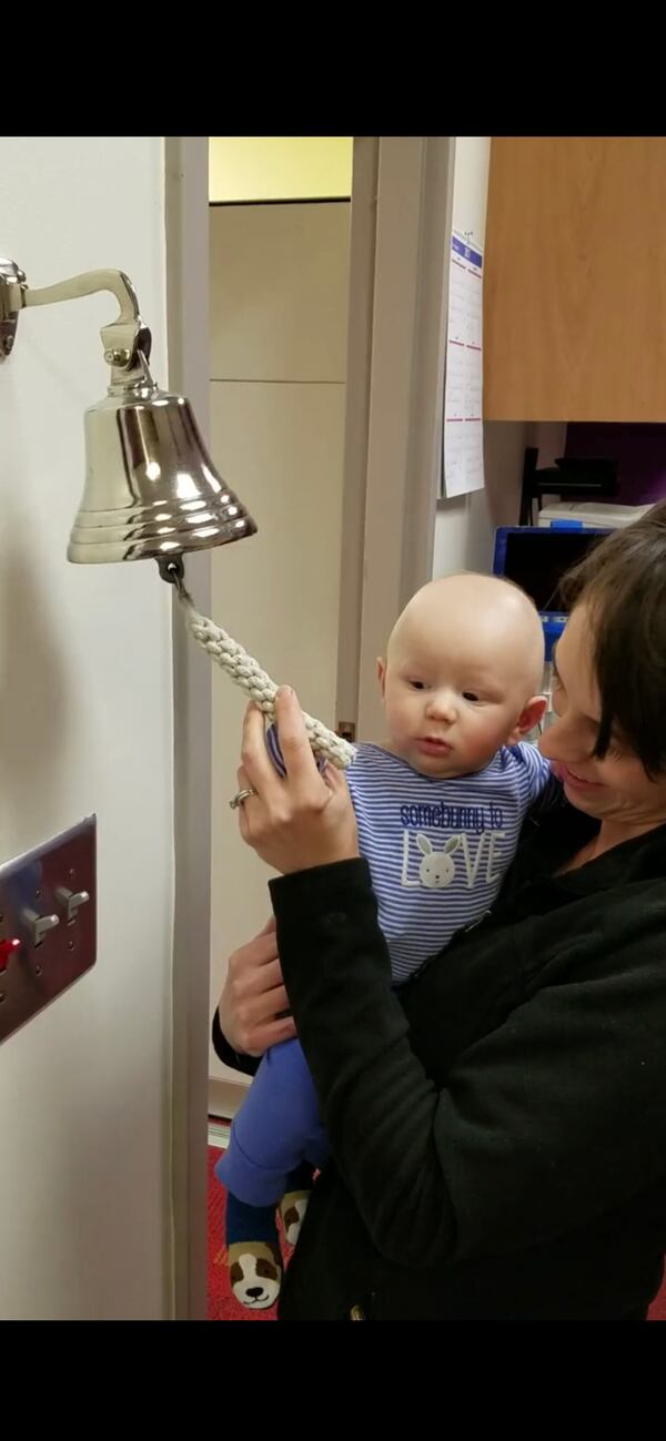 Caison Rush rings the bell at the Aflac Cancer and Blood Disorders Center of Children's Healthcare of Atlanta to celebrate his final chemotherapy treatment in 2017.