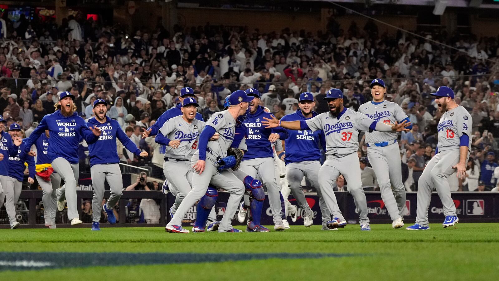 The Los Angeles Dodgers celebrate their win against the New York Yankees in Game 5 to win the baseball World Series, Wednesday, Oct. 30, 2024, in New York. (AP Photo/Godofredo A. Vásquez)