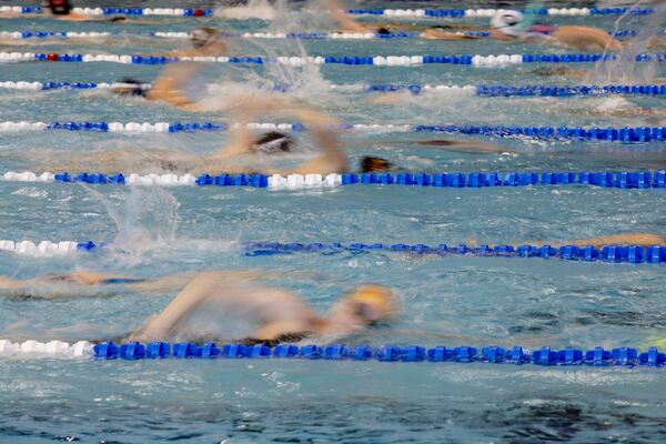 
                        FILE — Warmups before the 2022 NCAA Division I Women's Swimming and Diving Championships at Georgia Tech University, in Atlanta, Ga. on March, 19, 2022. The Biden administration proposed a rule change that would allow schools to block some transgender athletes from competing on sports teams that match their gender identities. (David Walter Banks/The New York Times)
                      