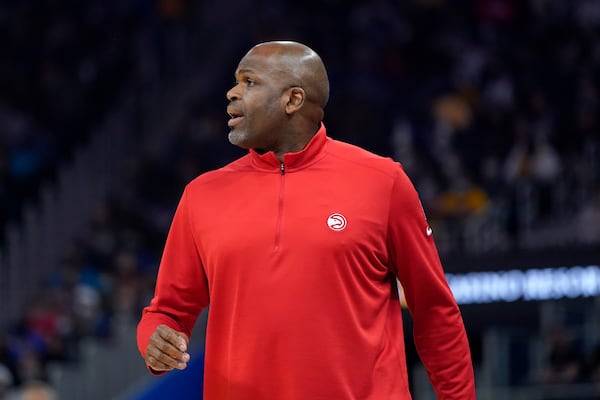 Atlanta Hawks head coach Nate McMillan watches from the sideline during the first half of his team's NBA basketball game against the Golden State Warriors in San Francisco, Monday, Nov. 8, 2021. (AP Photo/Jeff Chiu)