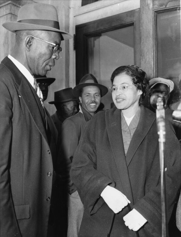 Mrs. Rosa Parks was escorted up the Montgomery County courthouse steps today (March 19) by E.D. Nixon, former president of the Alabama NAACP, as they arrived for trial in the racial bus boycott. Mrs. Parks was fined $14 on Dec. 5th for failing to move to the segregated section of a city bus. The boycott started on the day she was fined. There are 91 other defendants. (AP Photo) 1956