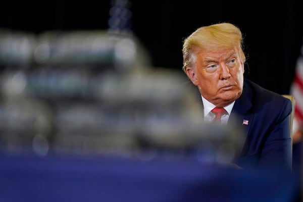 President Donald Trump listens during a briefing on counternarcotics operations at U.S. Southern Command, Friday, July 10, 2020, in Doral, Fla. (AP Photo/Evan Vucci)