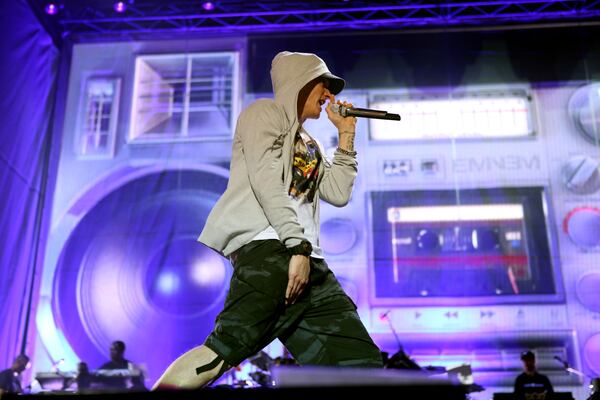 Sept 20, 2014 - ATLANTA - Marshall Bruce Mathers, more commonly known by his stage name Eminem, takes to the Electric Ballroom Stage on Day 2 of Music Midtown at Piedmont Park on Saturday. Eminem gives the audience a peek of cuts from his new release "ShadyXV, slated for November release. (Akili-Casundria Ramsess/Special to the AJC) Eminem stayed busy on the stage. Photo: Akili-Casundria Ramsess/Special to the AJC