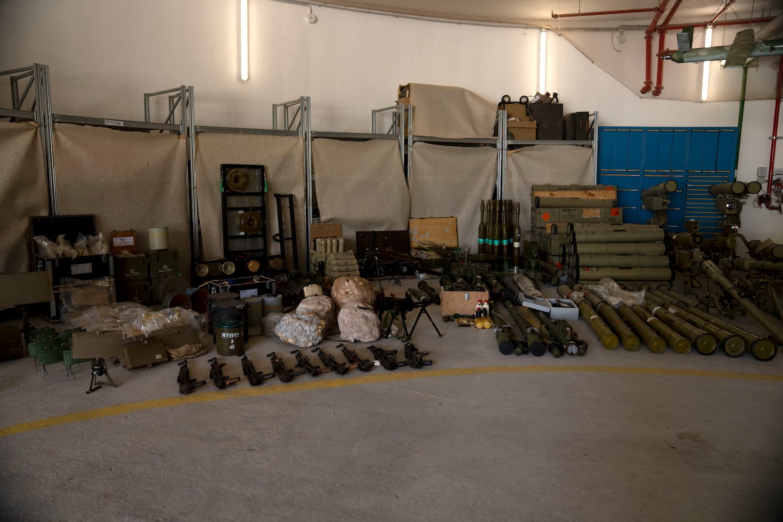 Weapons used by Hezbollah seized during combat operations in Lebanon are displayed during a government-organized media tour on a base in southern Israel, Wednesday, Oct. 9, 2024. (AP Photo/Maya Alleruzzo)