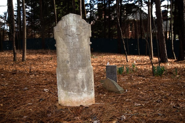 A headstone for April Waters who was enslaved by George Morgan Waters. Credit: STEVE SCHAEFER for The AJC