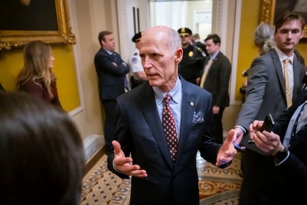 Sen. Rick Scott, R-Fla., speaks to reporters after Senate Republicans met with Elon Musk, at the Capitol in Washington, Wednesday, March 5, 2025. (AP Photo/Ben Curtis)