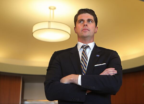 Seth Weathers, the political consultant who represents embattled Gwinnett County Commissioner Tommy Hunter, poses for a portrait at his Weatherscorp business office on Wednesday, March 15, 2017, in Cumming. Curtis Compton/ccompton@ajc.com