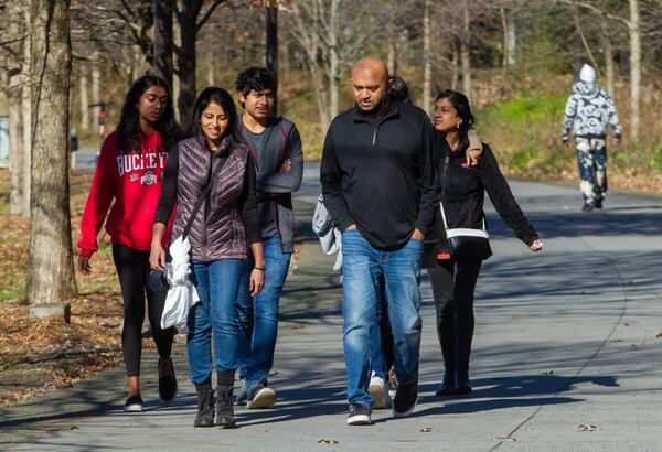 People walk along the Beltline in December.  STEVE SCHAEFER FOR THE ATLANTA JOURNAL-CONSTITUTION