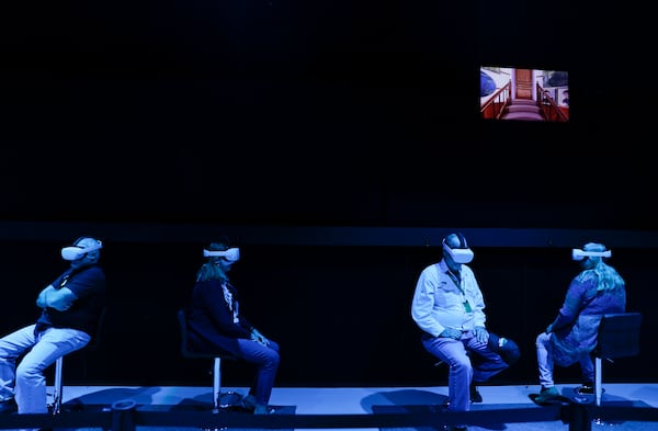 Visitors wear virtual reality goggles to enjoy the VR experience at “Monet: The Immersive Experience” on Friday, October 28, 2022. (Natrice Miller/natrice.miller@ajc.com)  