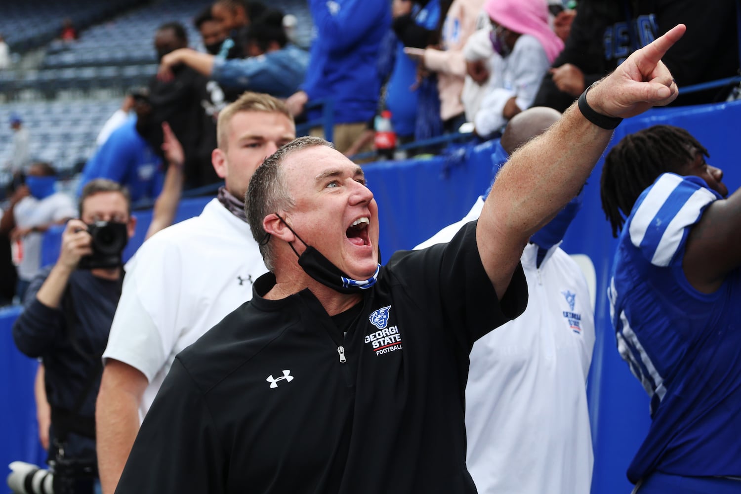 Georgia State coach Shawn Elliott celebrates a 30-24 victory over Georgia Southern Saturday. CHRISTINA MATACOTTA FOR THE ATLANTA JOURNAL-CONSTITUTION