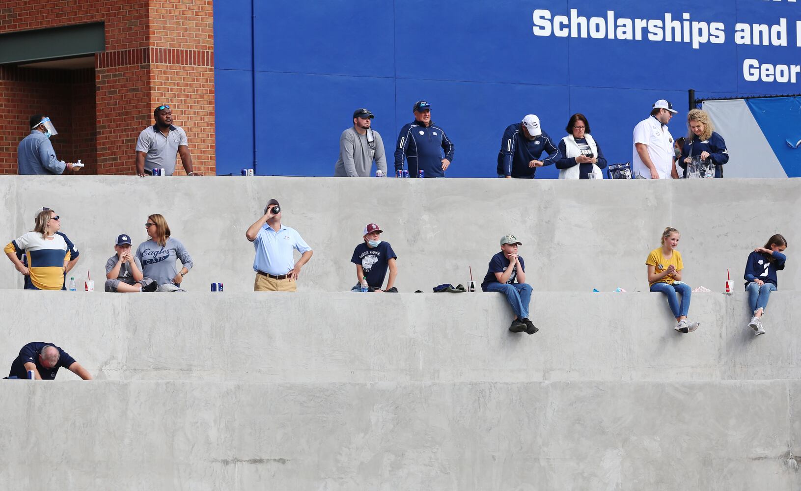 Fans watch the game at Georgia State's stadium in Atlanta. CHRISTINA MATACOTTA FOR THE ATLANTA JOURNAL-CONSTITUTION