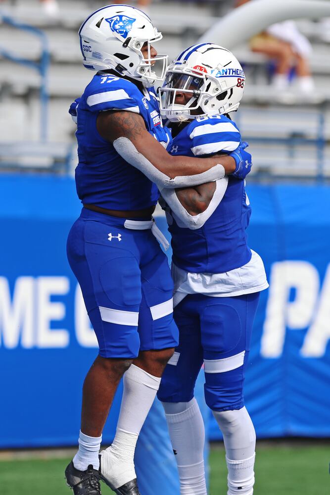 Cornelius McCoy (right) and Destin Coates chest bump after a Georgia State touchdown. CHRISTINA MATACOTTA FOR THE ATLANTA JOURNAL-CONSTITUTION