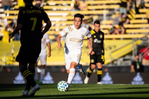 Atlanta United's Ezequiel Barco looks for room during a 2-1 loss in regular season finale to Columbus.