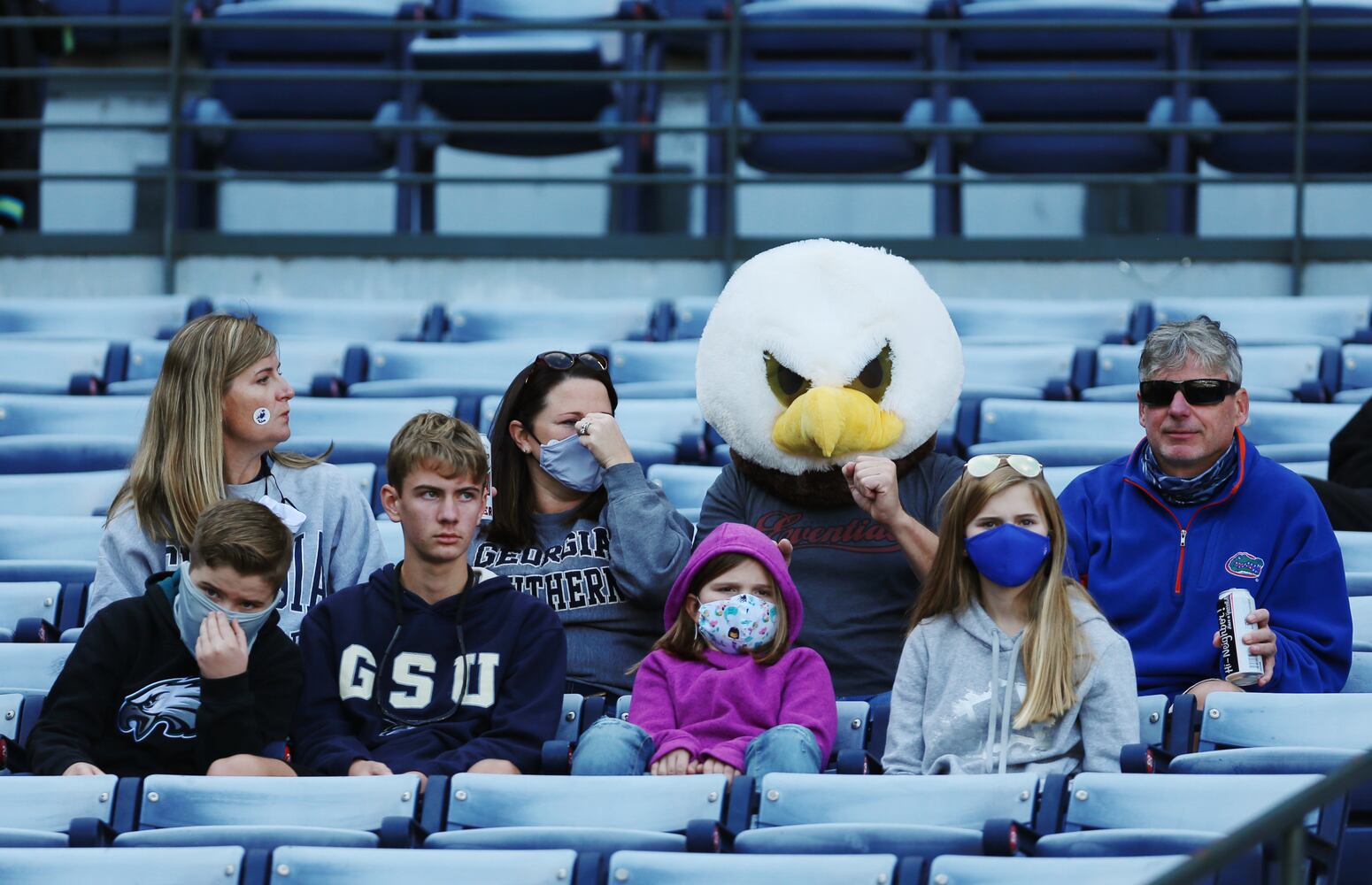 Georgia Southern fans watch the game. CHRISTINA MATACOTTA FOR THE ATLANTA JOURNAL-CONSTITUTION