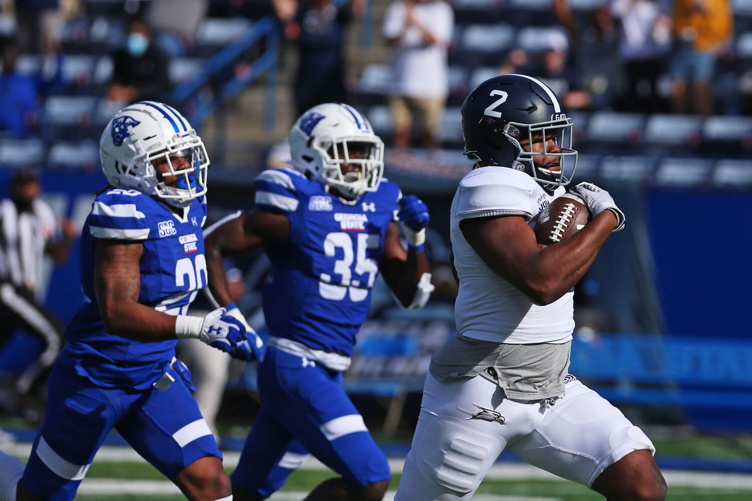 Logan Wright of Georgia Southern, runs the ball into the end zone against Georgia State on Saturday. CHRISTINA MATACOTTA FOR THE ATLANTA JOURNAL-CONSTITUTION