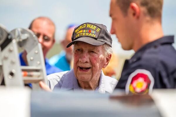 When he was a fighter pilot during WWII, James McCubbin used to jump into the cockpit of the P51 Mustang. Although the 101-year-old WWWII veteran wasn't able to make it inside the cockpit on Wednesday, Rome-Floyd firefighters were on standby to help if he wanted it. (Courtesy of Steven Eckhoff)