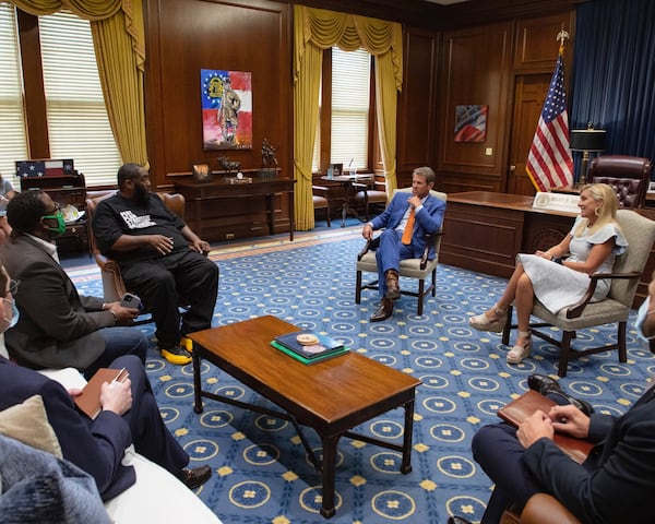 Gov. Brian Kemp meets with Atlanta hip-hop star Killer Mike in his ceremonial office. Credit: Kemp's office.