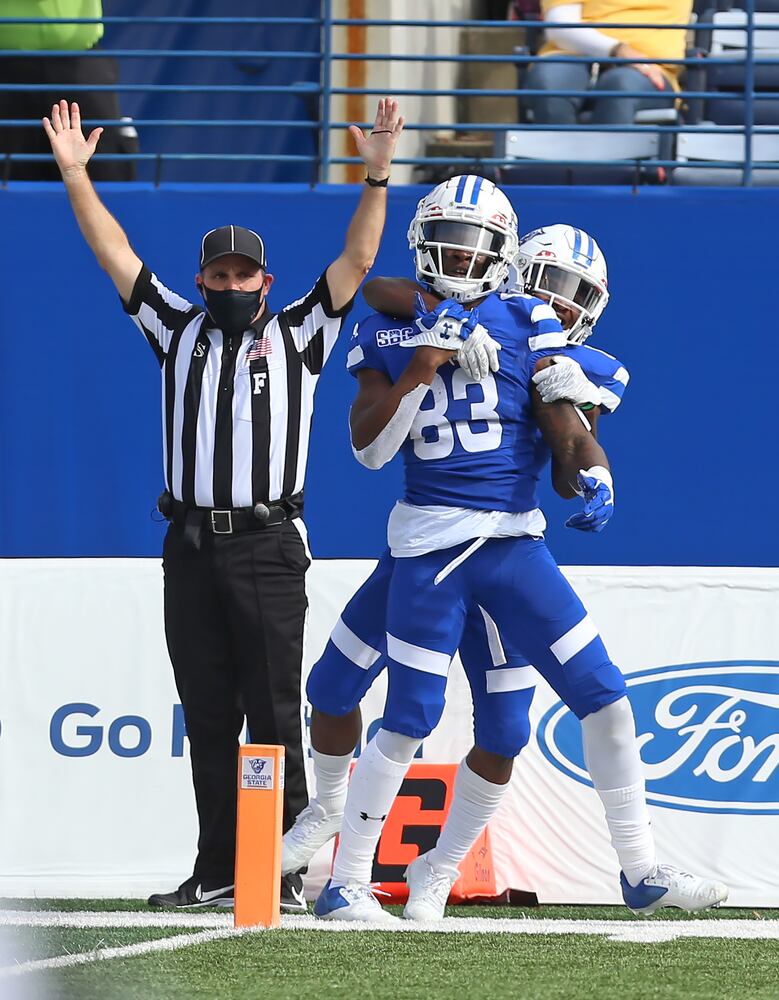 Cornelius McCoy (front) and Destin Coates celebrate after a Georgia State touchdown. CHRISTINA MATACOTTA FOR THE ATLANTA JOURNAL-CONSTITUTION