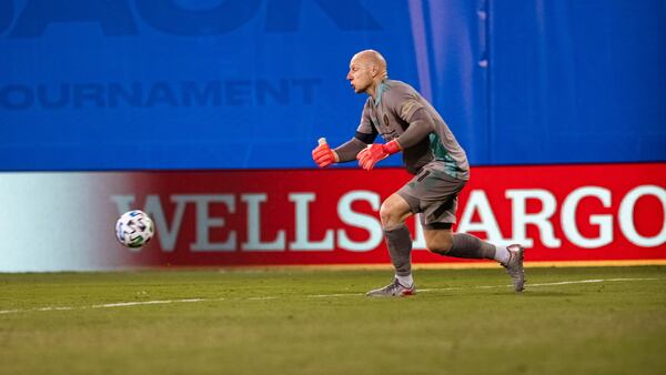 Goalkeeper Brad Guzan sends Atlanta United on the attack during MLS tournament matchup against Columbus Tuesday, July 21, 2020, in Orlando, Fla.